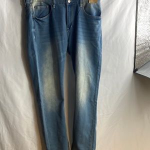 NWT MBX faded blue jeans are size 36x32.  Distressed denim.